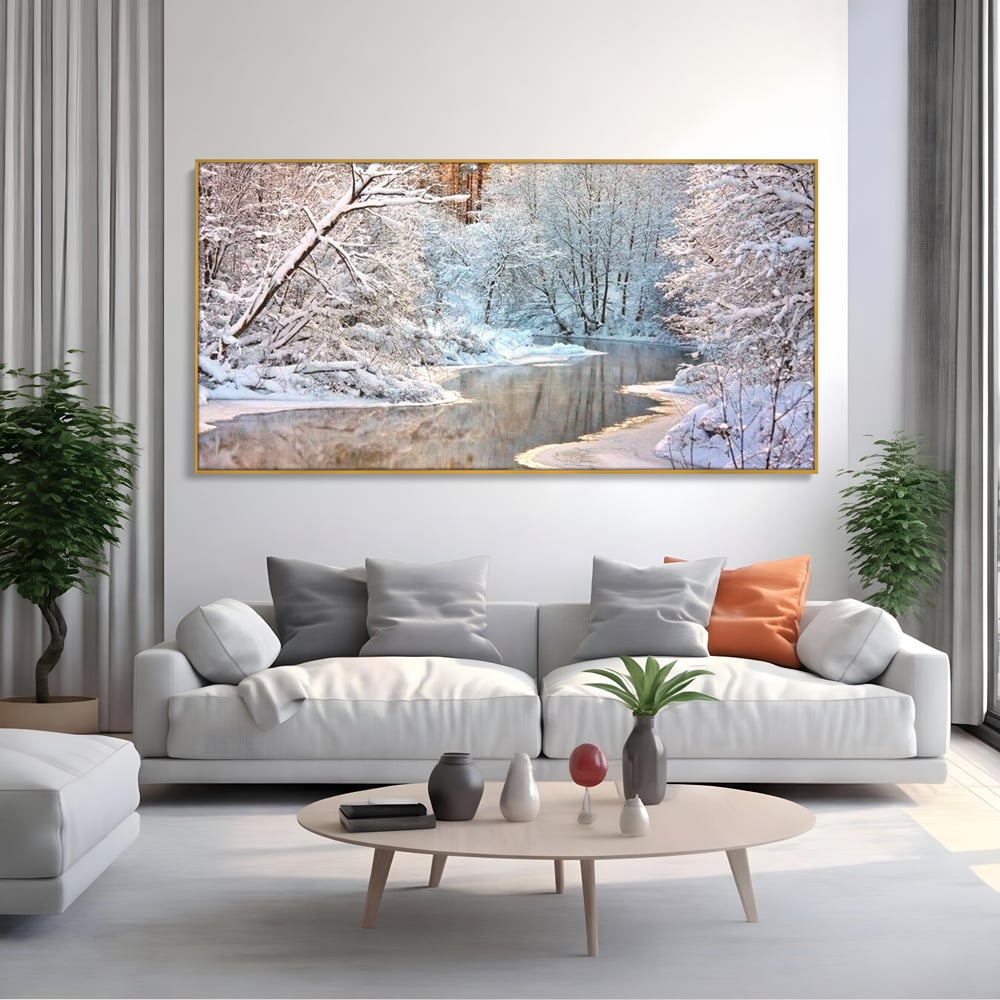 Tablou canvas cu tablou canvas cu peisaj de iarna pe rau, in rama de aluminiu auriu, pe perete intr-un living